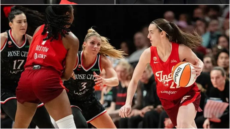 Caitlin Clark and Stephanie White with Portland Fire players in action during WNBA game